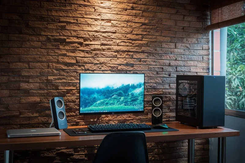 12 Home Designs Focus On Gamers With Clever Mix Of Comfort And Style To Level Up Space (Floor Plans Included) - Decor Hint Minimalist Open Floor Plan with Cable Management