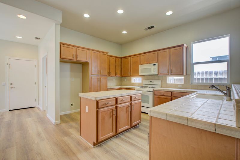 Kitchen Features That Could Make Your Space Feel Dated - Decor Hint Tile Countertops