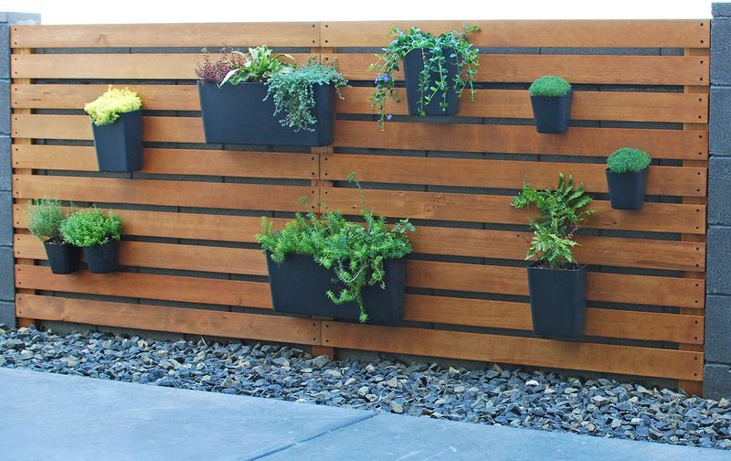 18 DIY Outdoor Decor Ideas That Look Way More Expensive Than They Are - Decor Hint Wall-Mounted Vertical Herb Garden