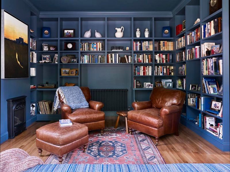 Tall bookcases that overpower the space