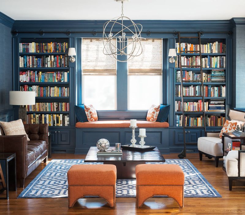 16 Tiny Room Layouts That Just Work - Decor Hint Tall Bookshelves Flanking a Window for Symmetry