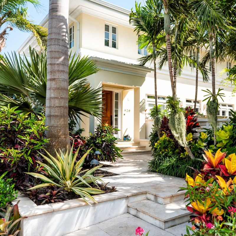 10 Coastal-Inspired Curb Appeal Ideas From Florida Homes - Decor Hint Tropical Landscaping