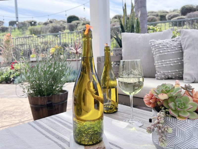 30 Smart Home Decorating Ideas That Cost Almost Nothing - Decor Hint Wine Bottle Tiki Torches