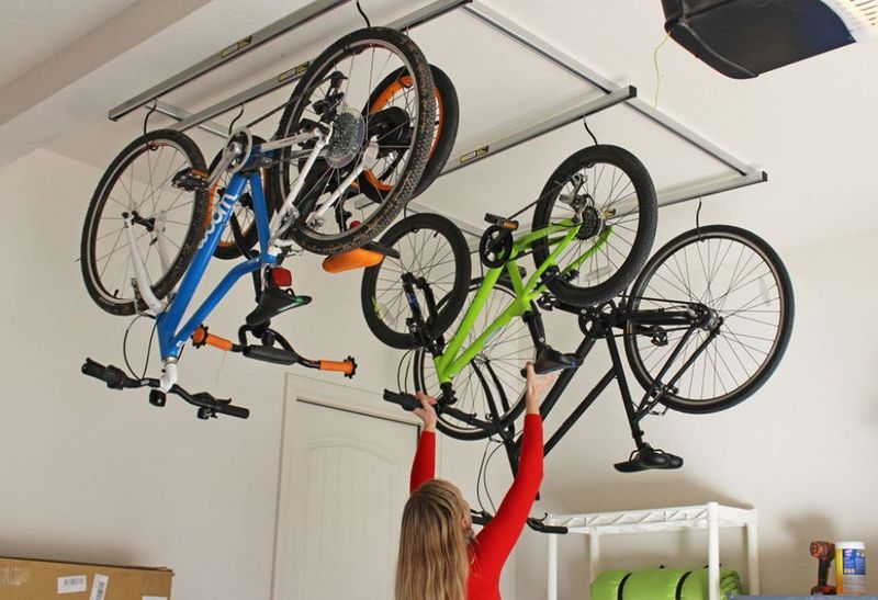 Clever Storage Ideas For Every Room In Your Home - Decor Hint Ceiling-Mounted Bike Hooks