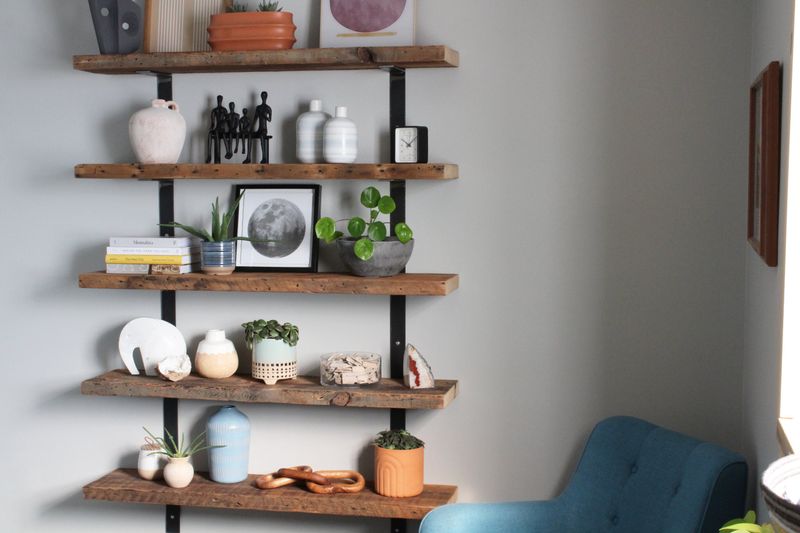 15 Functional And Stylish Farmhouse Living Room Ideas (Plus 5 You Will Absolutely Love) - Decor Hint Reclaimed wood shelving