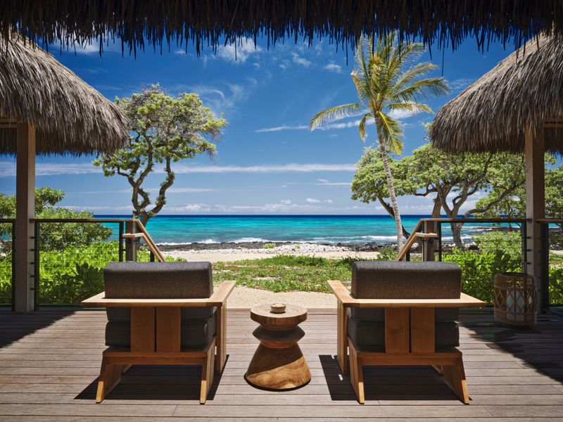 11 Backyards In Hawaii That Always Feel Like A Personal Escape - Decor Hint Thatched-Roof Lounges Styled With Island-Inspired Decor