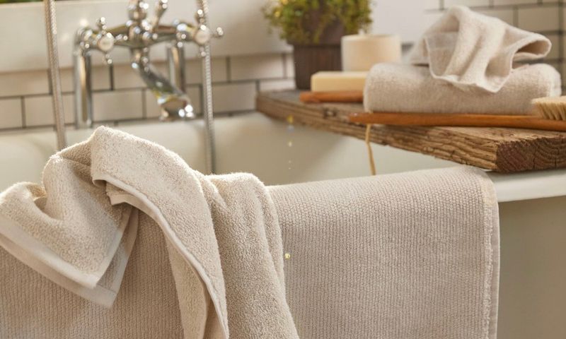 12 Interior Items Designers Say You Should Never Waste Money On (And 10 To Not Even Think About Buying) - Decor Hint Decorative Towels Nobody Can Use