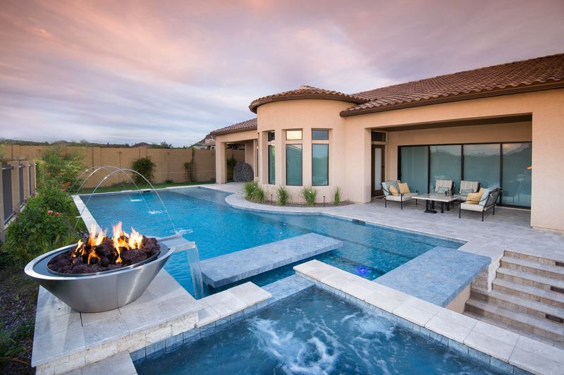 37 Stylish Poolside Designs That Make Everyday Feel Like Vacation - Decor Hint Fire Pit Surrounded By Water Features