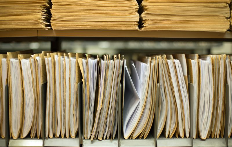 12 Household Items To Ditch After 60 And 7 You Shouldn't Have Had In The First Place - Decor Hint Paper Document Hoarding