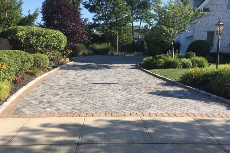Charming Outdoor Features Seen In New Jersey Homes - Decor Hint Cobblestone Driveways With Perennial Borders