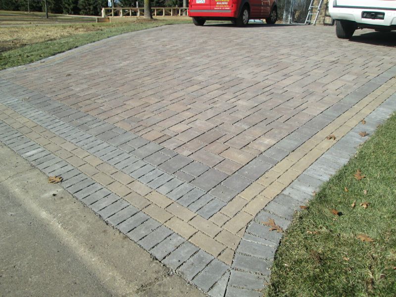 13 Suburban Home Features That Are Becoming Legal Headaches - Decor Hint Driveway pavers blocking stormwater drains
