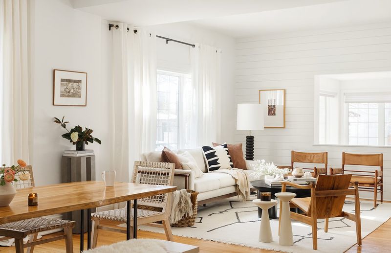 15 Decor Fixes For Rooms That Feel 'Off' - Decor Hint Balance Heavy Furniture with Lighter Pieces