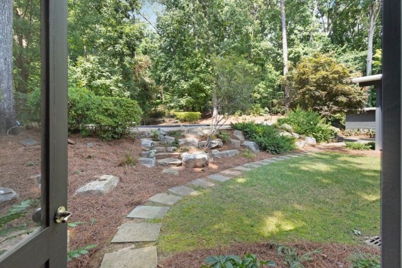 Tour This Iconic Mid-Century Marvel Hidden In The Hills Of Buckhead - Decor Hint Lush Landscaping Creates Natural Privacy Screen