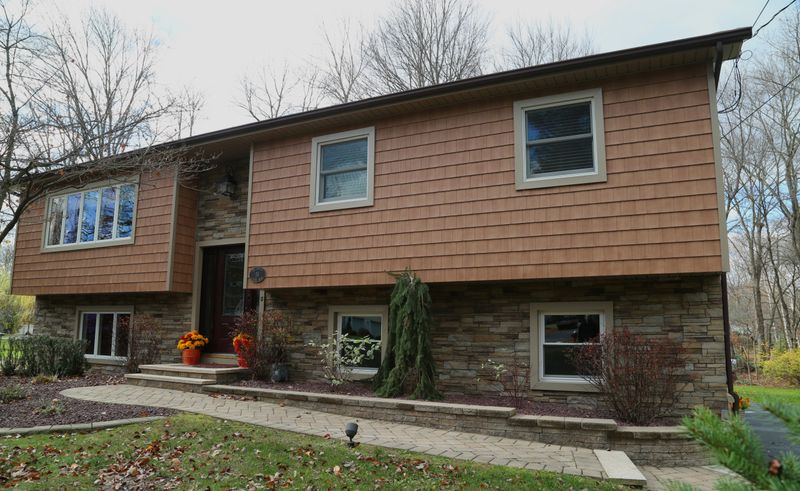 12 Dated Ohio House Styles That May Not Make It To The Next Generation - Decor Hint Raised Ranches Covered In Faux Stone Veneer