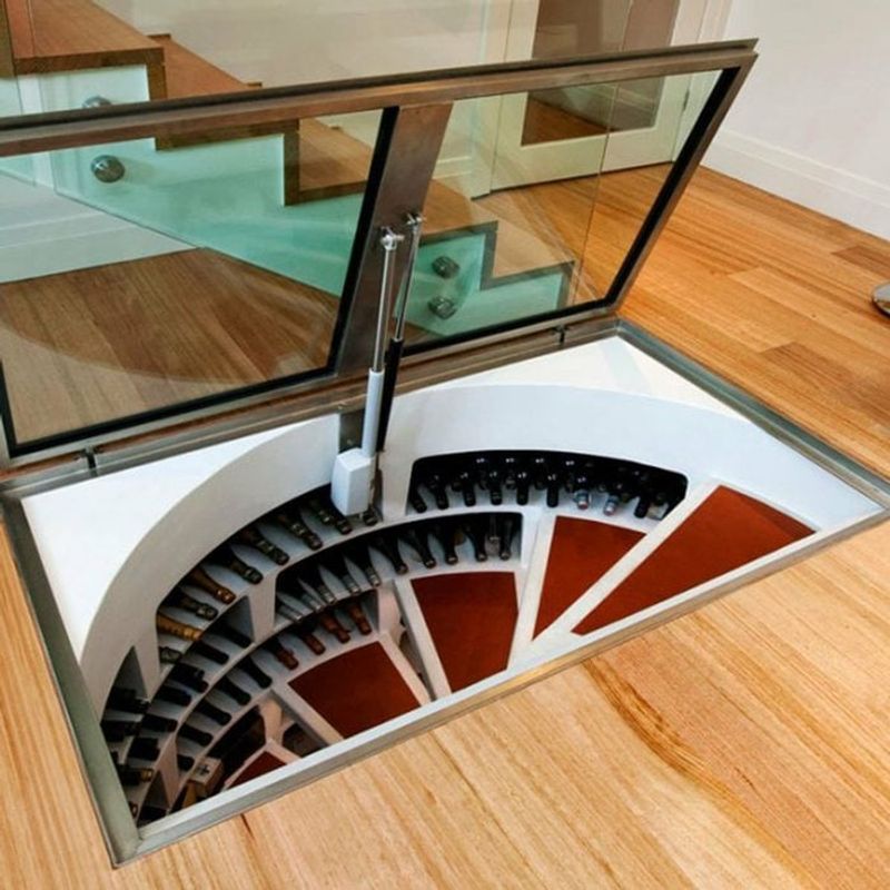 16 Ways How Designers Use Hidden Doors: The Whimsical Trend That Can Actually Be Very Practical - Decor Hint Concealed Basement Stair Access