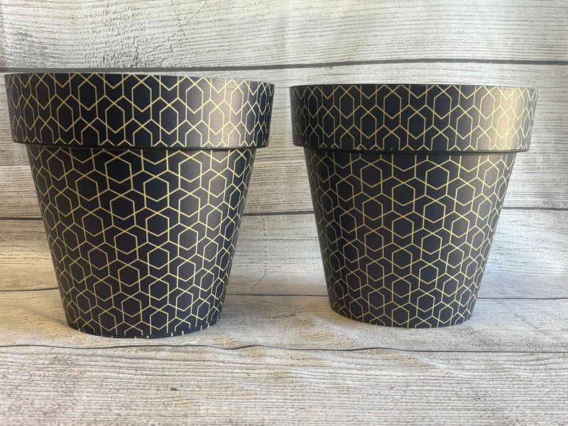 18 DIY Outdoor Decor Ideas That Look Way More Expensive Than They Are - Decor Hint Painted Terracotta Pots with Geometric Designs