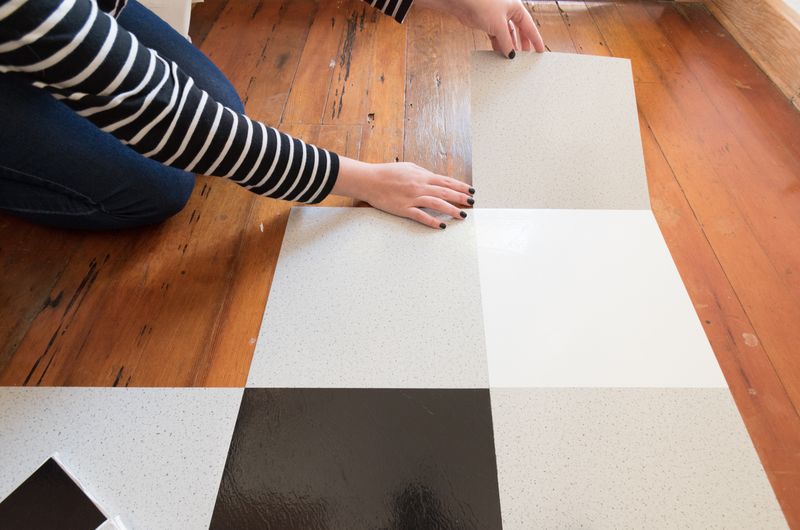 22 Items Designers Say Make Your Kitchen Look Cheap - Decor Hint Vinyl Flooring That Mimics Tile