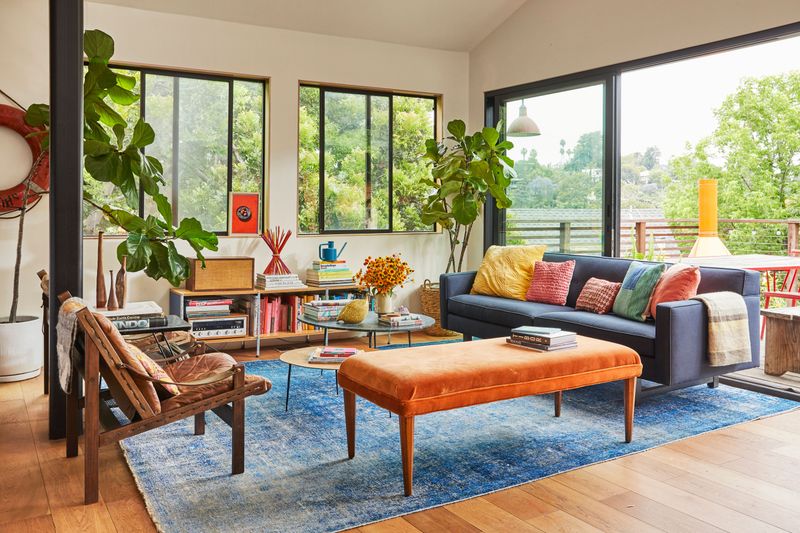 15 Decor Fixes For Rooms That Feel 'Off' - Decor Hint Add a Rug to Anchor the Space