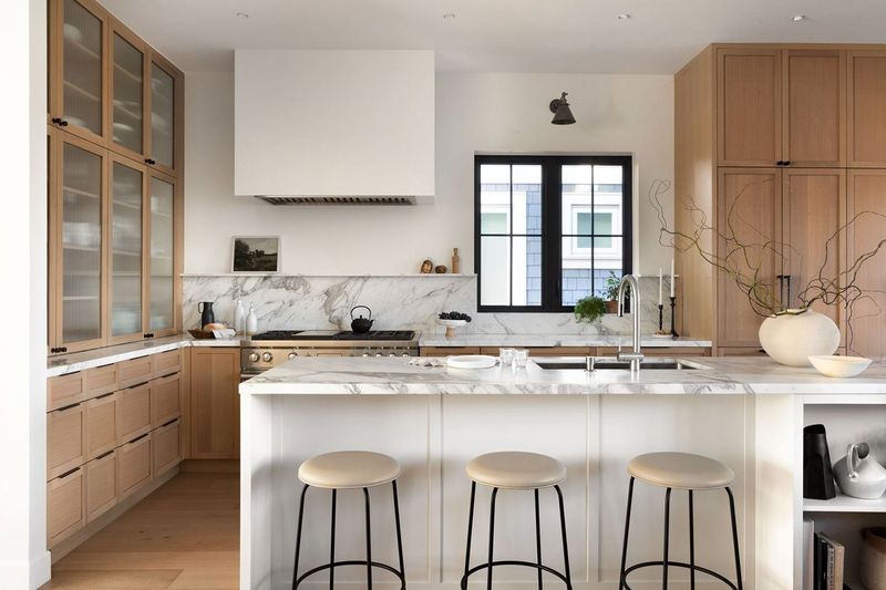8 Kitchen Cabinet Looks Falling Out Of Style in Alabama And 5 Designers Still Love - Decor Hint Two-Tone Cabinets with Clashing Finishes