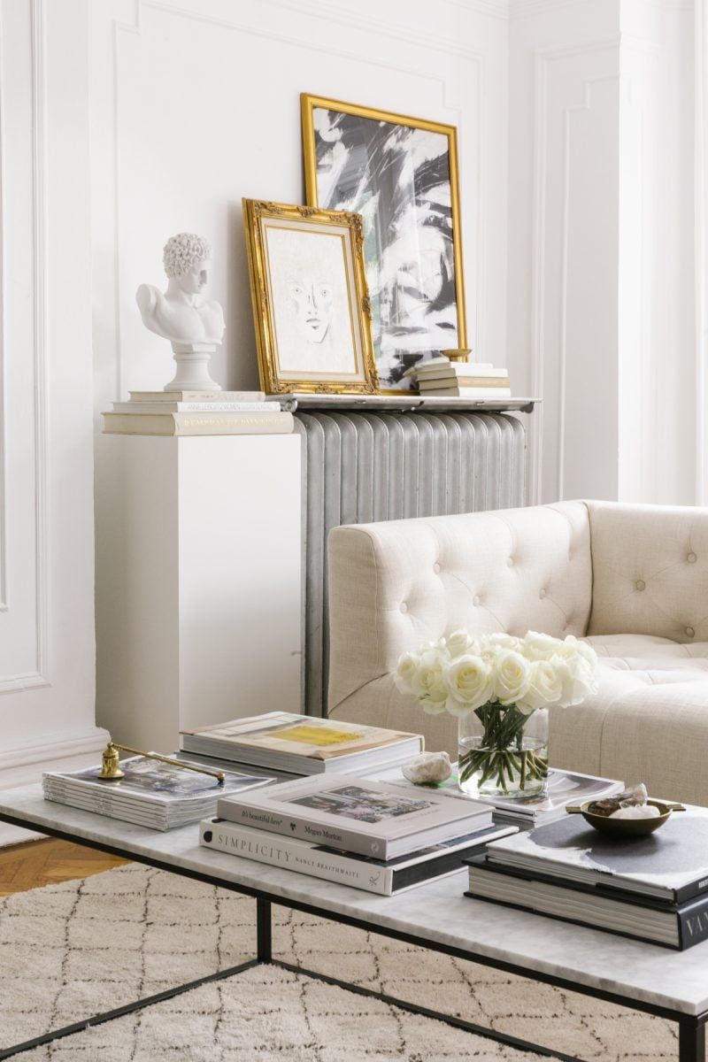 19 Layering Techniques That Make Any Room Feel Professionally Styled - Decor Hint Stack Books on Coffee Tables or Shelves