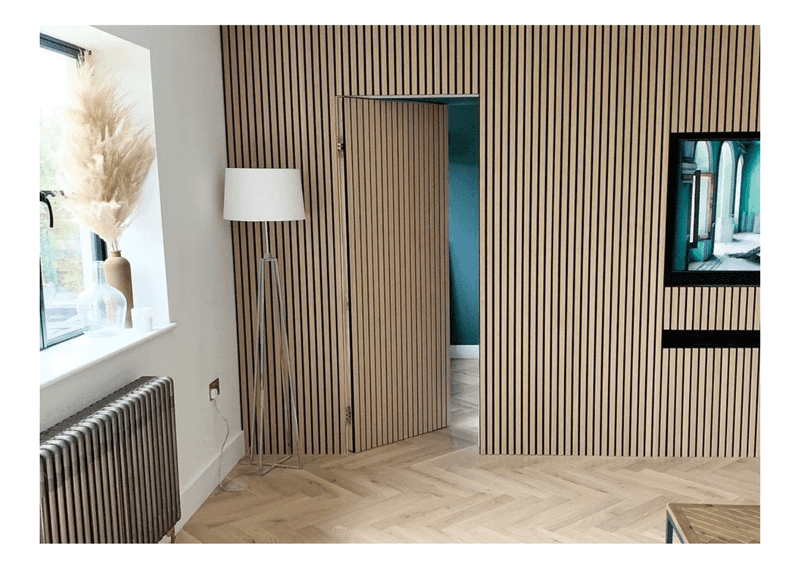 16 Ways How Designers Use Hidden Doors: The Whimsical Trend That Can Actually Be Very Practical - Decor Hint Accent Wall with Integrated Door