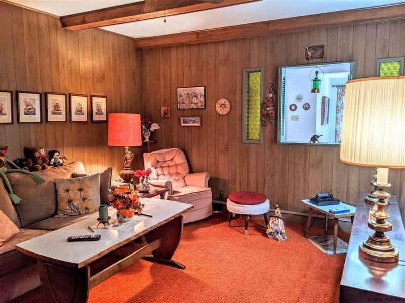 10 Furniture Colors To Ditch In 2025 And 10 That Should've Never Happened - Decor Hint Orange-Brown Wood Paneling