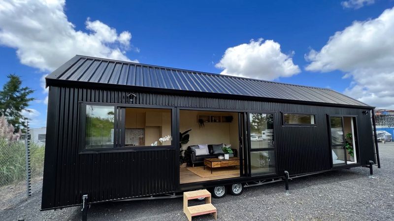 22 Coolest Tiny Homes On Wheels Cruising Around Texas - Decor Hint Black Exterior Tiny