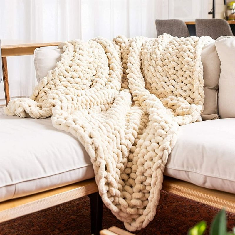 15 Functional And Stylish Farmhouse Living Room Ideas (Plus 5 You Will Absolutely Love) - Decor Hint Cozy knit throws