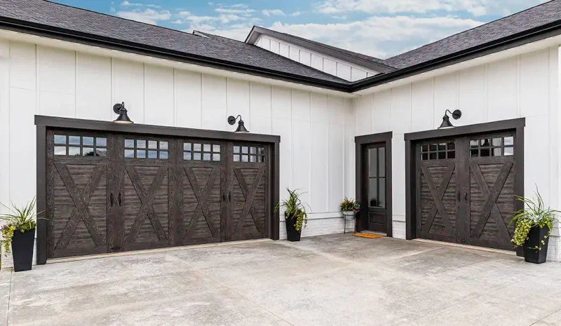 Modern Farmhouse Vibes: 11 Outdoor Looks Borrowed From 2025's Best Iowa Homes - Decor Hint Barn-Inspired Garage Doors