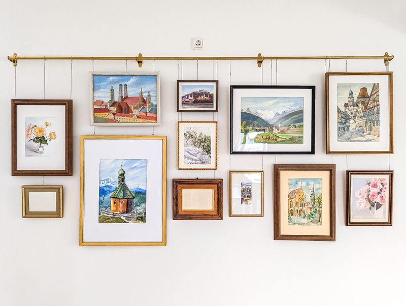 13 Home Styling Tricks That Look Luxe But Cost Almost Nothing - Decor Hint Gallery Wall from Calendar Art