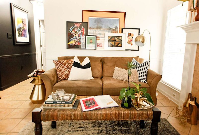 18 Reasons Your Living Room Feels Smaller Than It Is, According To Designers - Decor Hint Cluttered Coffee Table