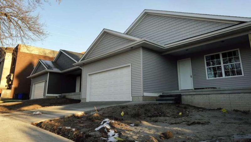 17 American Home Styles That Will Be Considered Obsolete By 2030 - Decor Hint Garage-Dominant Facades