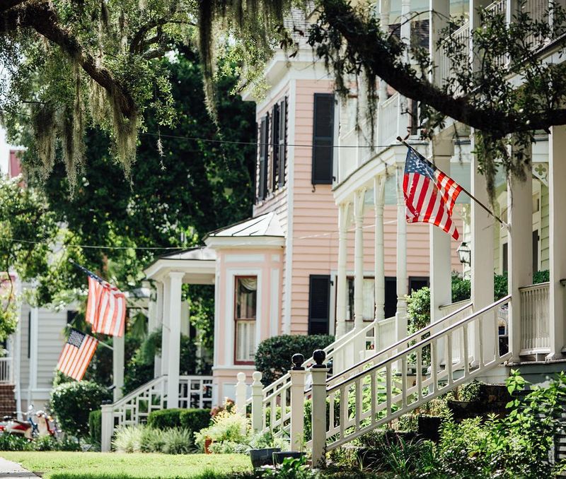 12 Front Porch Looks That Define South Carolina Welcoming Style - Decor Hint American and State Flags on Display