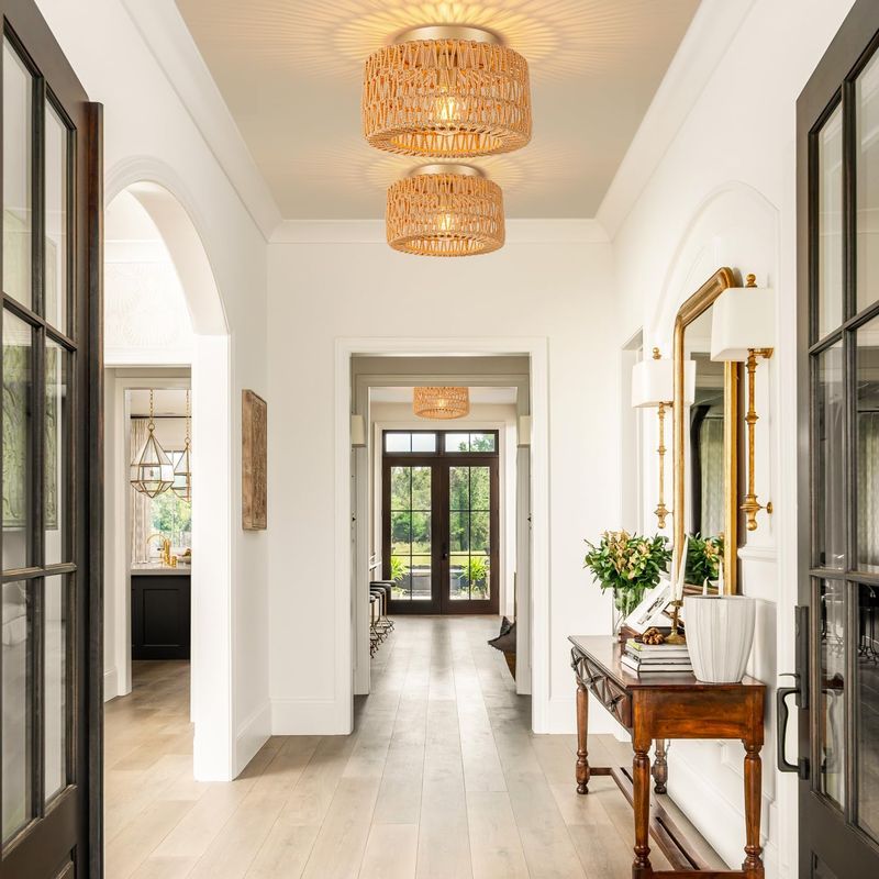 14 Entryway Ideas That Instantly Elevate Georgia Homes - Decor Hint Statement pendant light (glass or rattan)