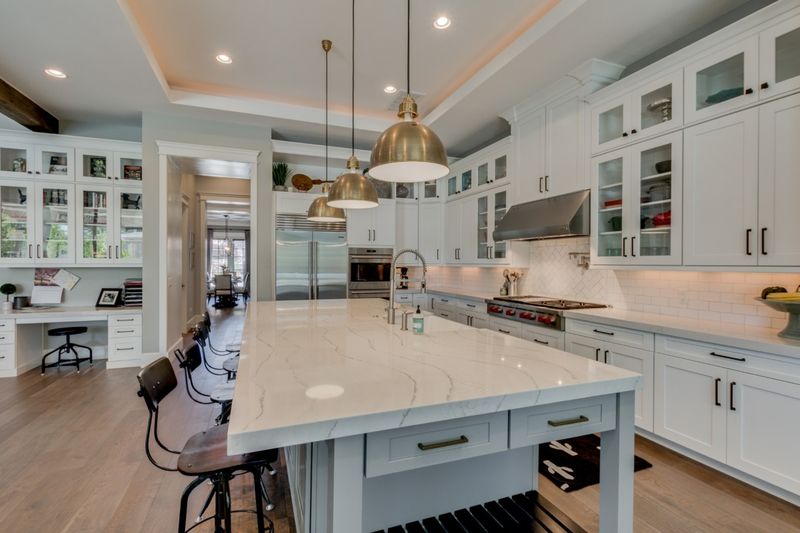 In Stockton Homes 12 Kitchen Looks Are Losing Favor 10 Stylish Ones Remain - Decor Hint Glass-Front Cabinets for Display Adding Elegance
