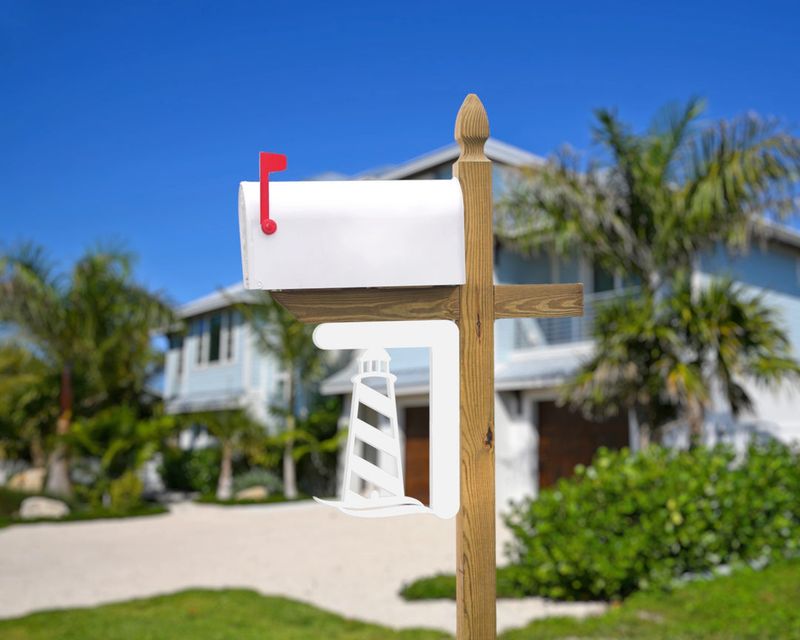 12 Coastal-Inspired Curb Appeal Ideas Seen In California Homes (And 3 That Are Losing Charm Fast) - Decor Hint Lighthouse Mailboxes (Losing Charm)