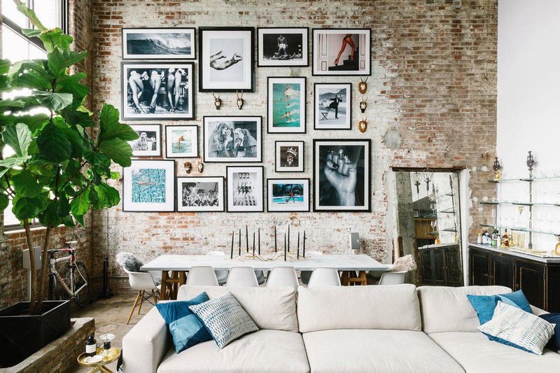 18 Reasons Your Living Room Feels Smaller Than It Is, According To Designers - Decor Hint Busy Wall Art Displays