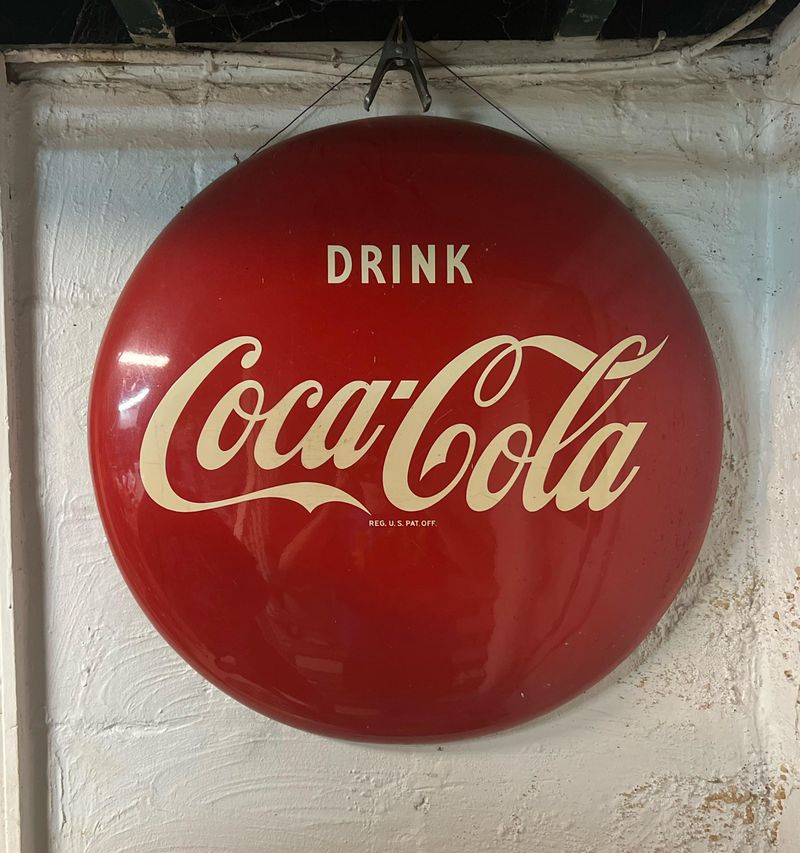 You Might Be Sitting On A Fortune 12 Home Items From The 1900s That Could Make You Rich - Decor Hint Vintage Coca-Cola Signs