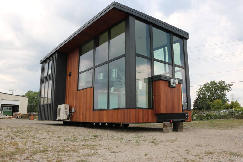 22 Coolest Tiny Homes On Wheels Cruising Around Texas - Decor Hint Modern Glass Tiny