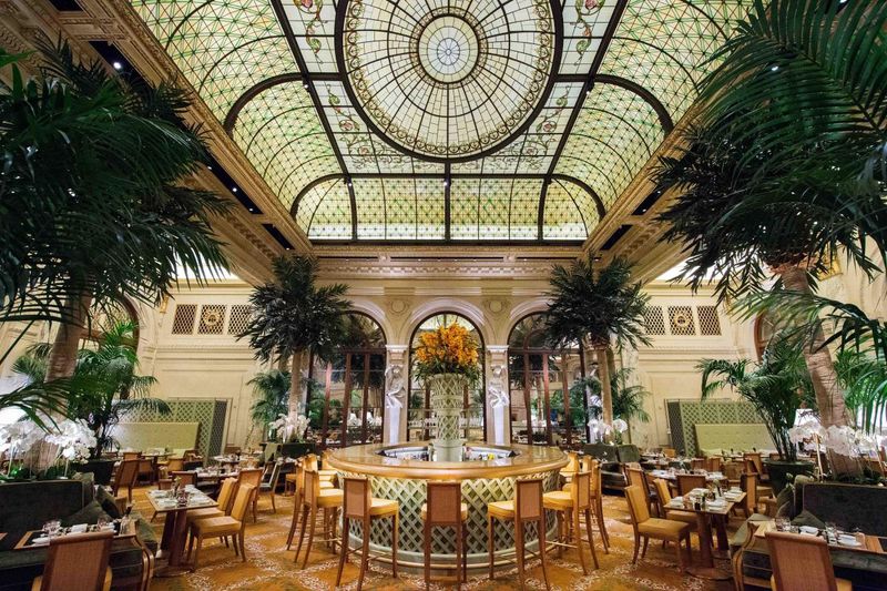 These 15 Photos Capture America’s Wealth At Its Most Extravagant - Decor Hint The Palm Court at The Plaza Hotel – New York City