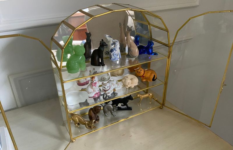 6 Living Room Items In San Luis Obispo Homes That Have Lost Value And 5 That Never Had It - Decor Hint Curio Cabinets Full of Collectibles