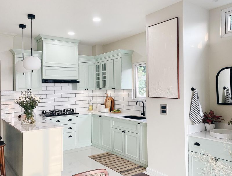 16 Colors To Paint Your Small Kitchen Cabinets That Aren't Just White - Decor Hint Pale Mint