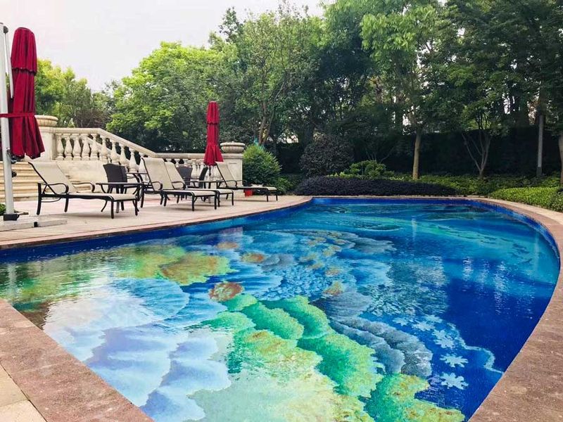 37 Stylish Poolside Designs That Make Everyday Feel Like Vacation - Decor Hint Tiled Mosaic Pool Floor