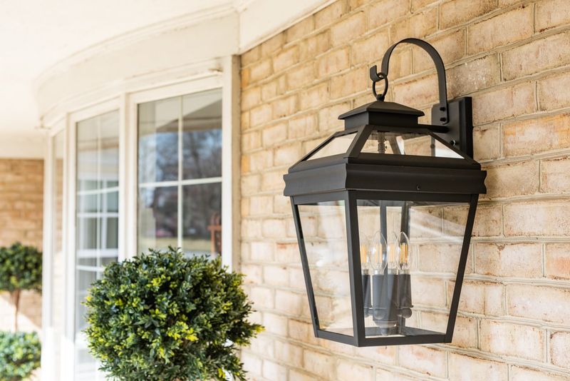 8 Outdated Porch Décor Trends That Are Reducing Your Curb Appeal - Decor Hint Mismatched Porch Light Fixtures