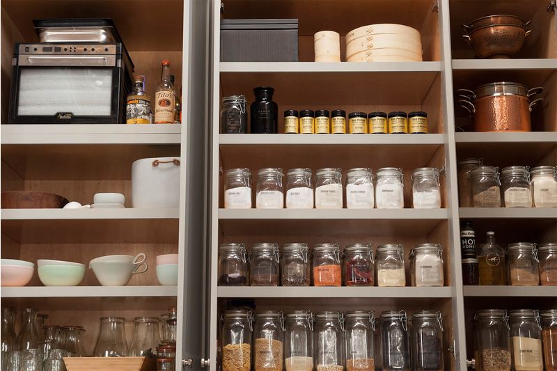 12 Inexpensive Ways To Makeover Your Kitchen, According To Designers - Decor Hint Organize With Pretty Containers