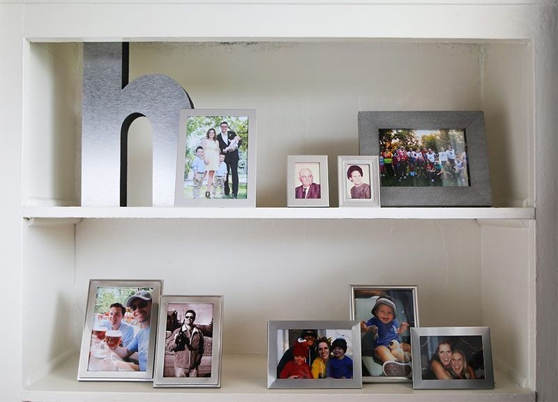 12 Items In Your Living Room That Make Your Home Look Cluttered - Decor Hint Mismatched Photo Frames