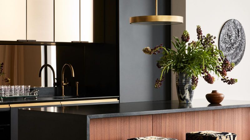 9 Expensive-Looking Decor Trends You'll See Everywhere This Year, Designers Say - Decor Hint Mixed Metals with Intentional Contrast