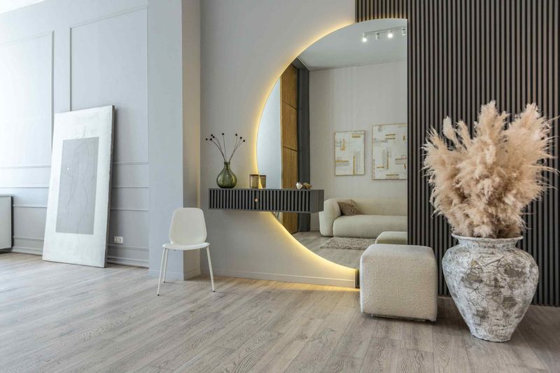 7 Small Room Decor Trends That Designers Say Will Be Forever Favorites In 2025 And Beyond - Decor Hint Statement Mirrors As Visual Expanders