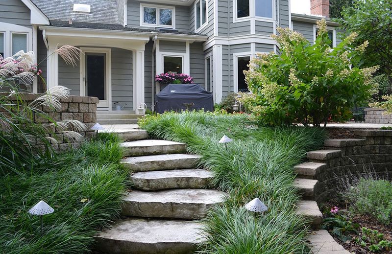 8 Classic Curb Appeal Trends From Illinois' Historic Homes, Still Wowing Neighbors In 2025 - Decor Hint Stone Pathways That Ground The Journey