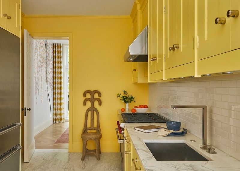 16 Colors To Paint Your Small Kitchen Cabinets That Aren't Just White - Decor Hint Buttery Yellow